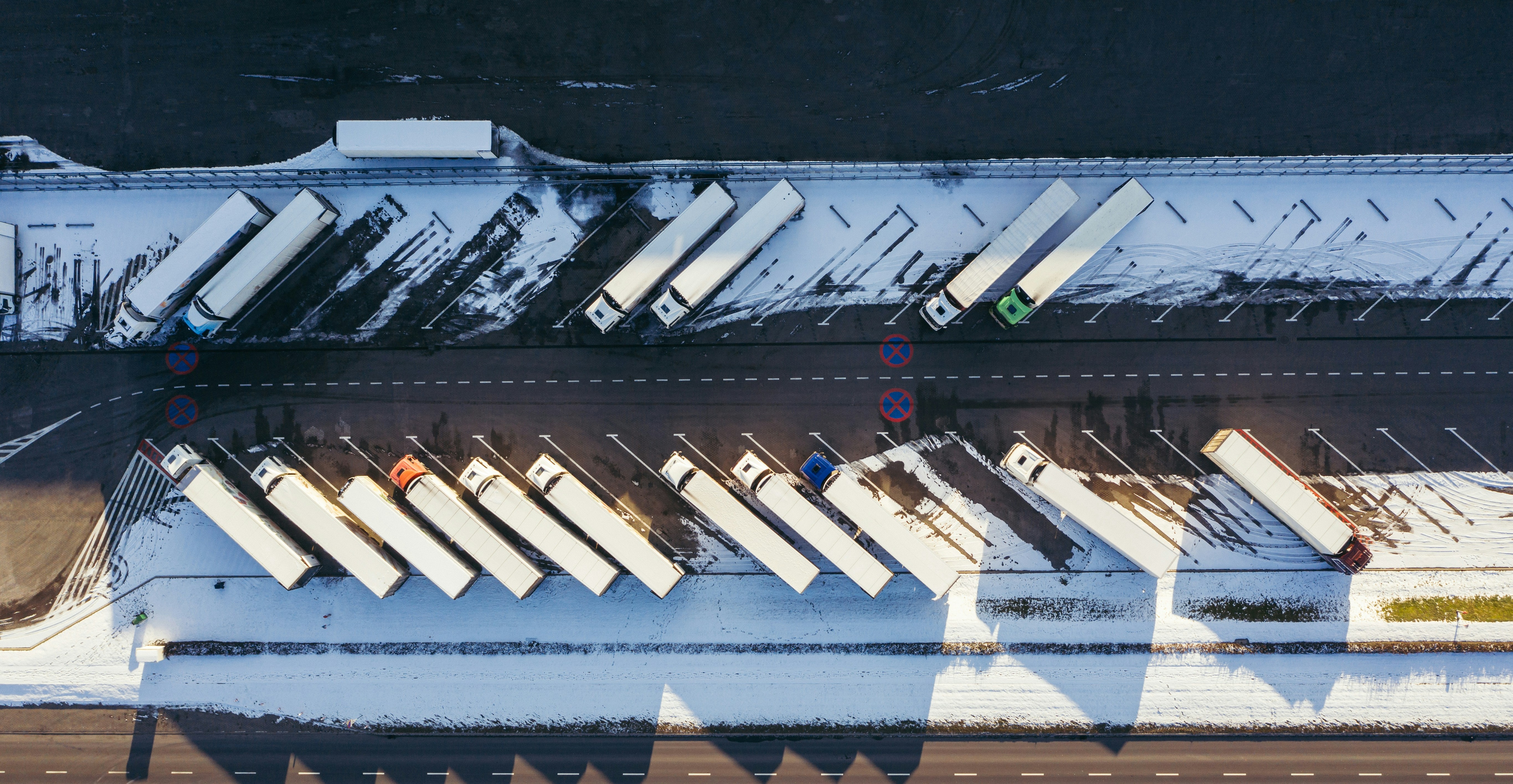 Freight trucks at a distribution terminal